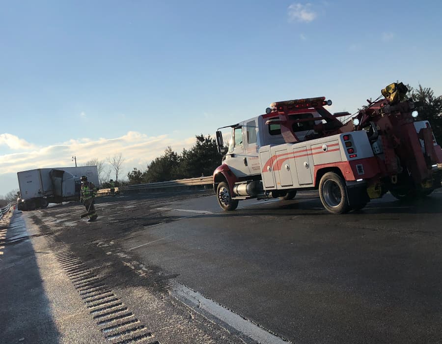 Dexter Towing & Recovery Michigan tow truck at accident scene